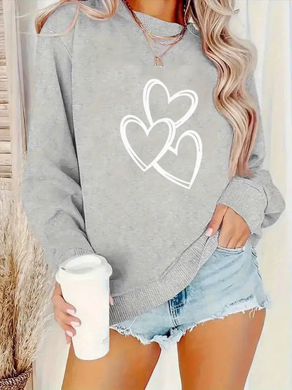 Heart of Love Sweater | Together against breast cancer